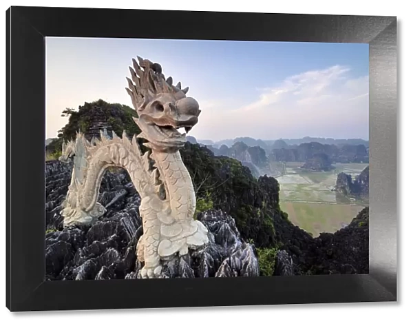 Dragon sculpture on a limestone hill, near Ninh Binh, Dry Halong Bay, Vietnam, Southeast Asia, Asia