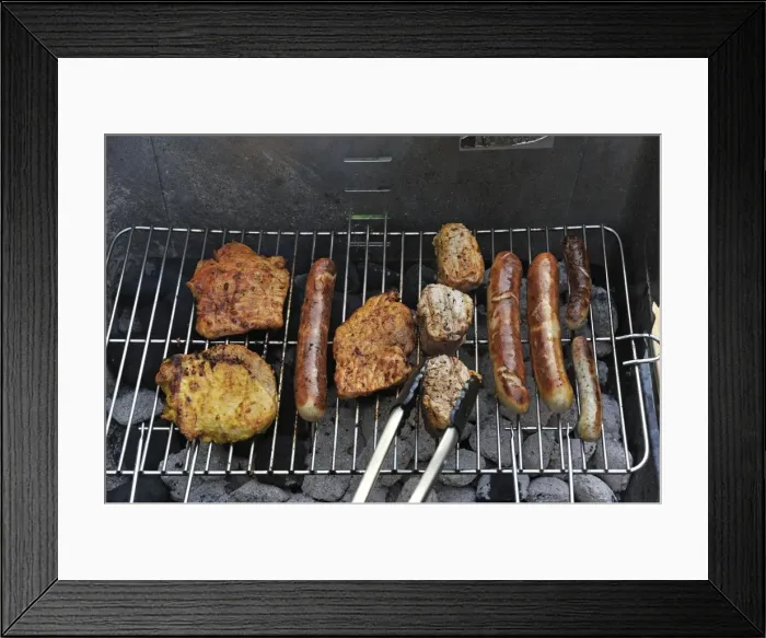 Framed Print : Meat and sausages or bratwursts on a grill, Germany Framed Print : Meat and sausages or bratwursts on a grill, Germany