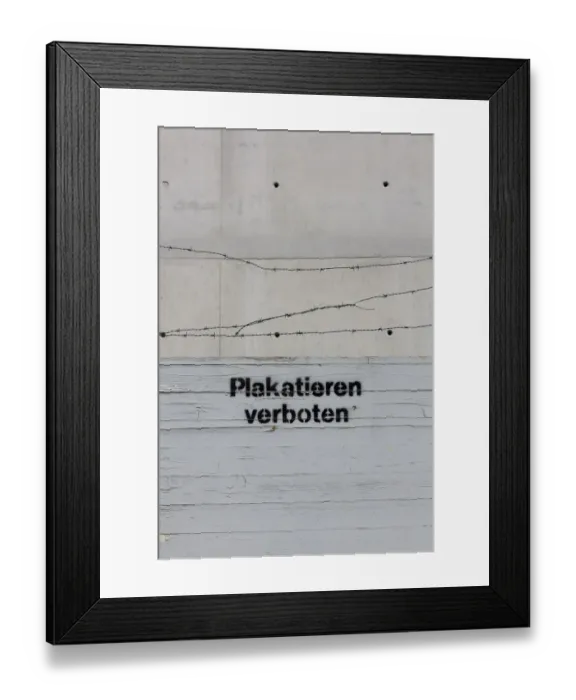 Framed Print : Sign Plakatieren verboten, German for no flyposting with barbed wire Framed Print : Sign Plakatieren verboten, German for no flyposting with barbed wire