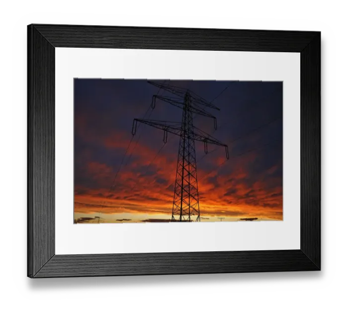 Framed Print : Electricity pylon against a red evening sky, Bavaria, Germany Framed Print : Electricity pylon against a red evening sky, Bavaria, Germany