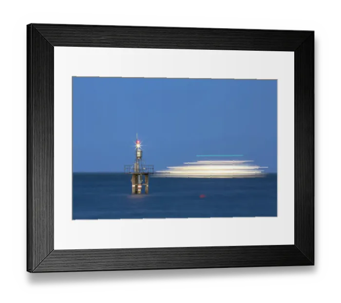Framed Print : Evening mood with a with moving ship at the Hoernle Lighthouse, Lake Constance, Konstanz, Baden-Wurttemberg, Germany Framed Print : Evening mood with a with moving ship at the Hoernle Lighthouse, Lake Constance, Konstanz, Baden-Wurttemberg, Germany