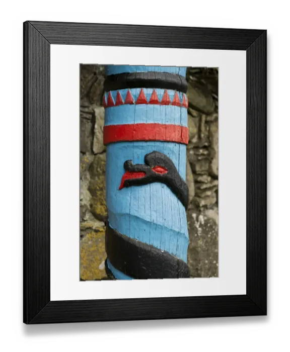 Framed Print : Black Midgard Serpent or World Serpent, carved wooden pillar, Kirkjubour, Streymoy, Faroe Islands, Denmark Framed Print : Black Midgard Serpent or World Serpent, carved wooden pillar, Kirkjubour, Streymoy, Faroe Islands, Denmark