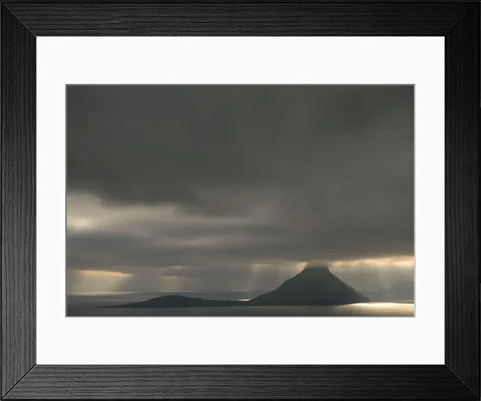 Framed Print : Dramatic mood lighting, low clouds, rays of light falling on the sea, Koltur, Utoyggjar, Faroe Islands, Denmark Framed Print : Dramatic mood lighting, low clouds, rays of light falling on the sea, Koltur, Utoyggjar, Faroe Islands, Denmark