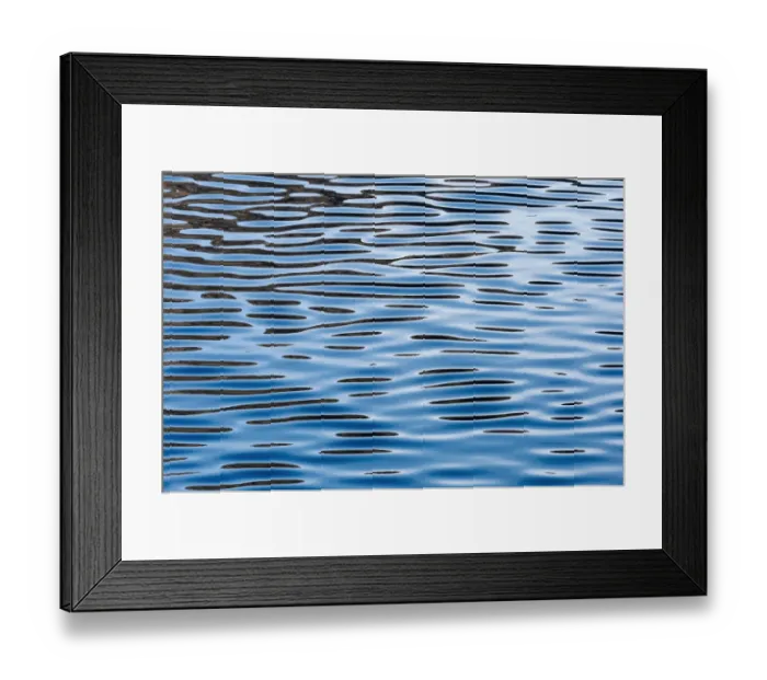 Framed Print : Reflections on a calm sea surface, Faroe Islands, Denmark