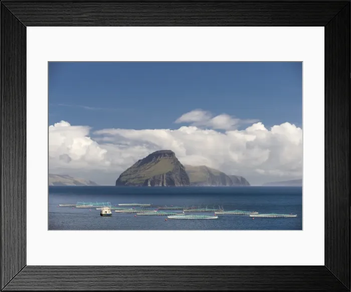 Framed Print : Fish farm, clouds and sea, in front of the smallest inhabited island of the Faroe Islands, Koltur, Utoyggjar, Faroe Islands, Denmark Framed Print : Fish farm, clouds and sea, in front of the smallest inhabited island of the Faroe Islands, Koltur, Utoyggjar, Faroe Islands, Denmark