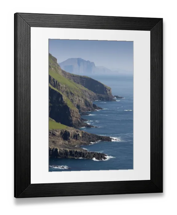 Framed Print : Rocky coast of Mykines, Vagar behind, Mykines, Utoyggjar, Faroe Islands, Denmark Framed Print : Rocky coast of Mykines, Vagar behind, Mykines, Utoyggjar, Faroe Islands, Denmark