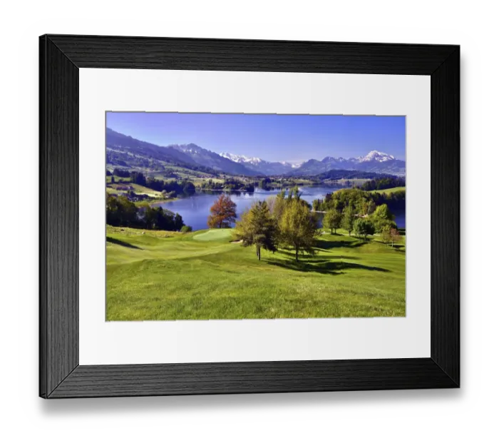 Framed Print : Golf course on the Lake of Gruyere or Lac de la Gruyere, Fribourg Alps at the back with Mt Moleson or Le Moleson, Canton of Fribourg, Switzerland Framed Print : Golf course on the Lake of Gruyere or Lac de la Gruyere, Fribourg Alps at the back with Mt Moleson or Le Moleson, Canton of Fribourg, Switzerland