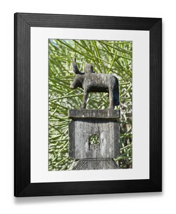 Framed Print : Totem carved from wood, bull, arboretum of Tulear or Toliara, Madagascar