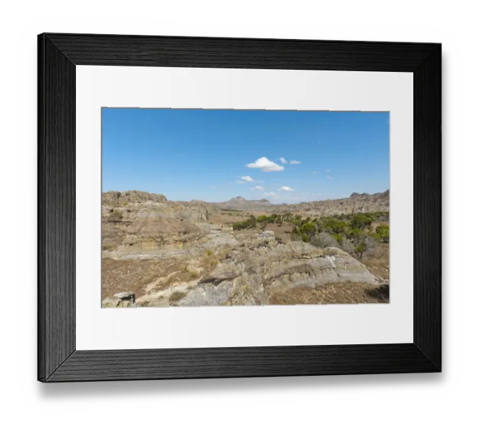 Framed Print : Dry and wide erosional landscape with rocks and trees, Isalo National Park, at Ranohira, Madagascar Framed Print : Dry and wide erosional landscape with rocks and trees, Isalo National Park, at Ranohira, Madagascar