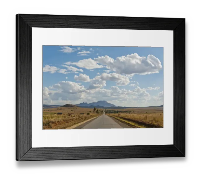 Framed Print : Long straight road, vast arid landscape, sky with clouds, Isalo National Park near Ranohira, Madagascar Framed Print : Long straight road, vast arid landscape, sky with clouds, Isalo National Park near Ranohira, Madagascar