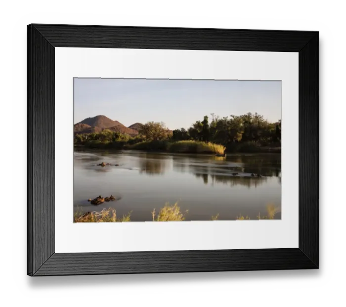 Framed Print : View over the border river of Kunene towards Angola, Kaokoland, Kunene Region, Namibia Framed Print : View over the border river of Kunene towards Angola, Kaokoland, Kunene Region, Namibia