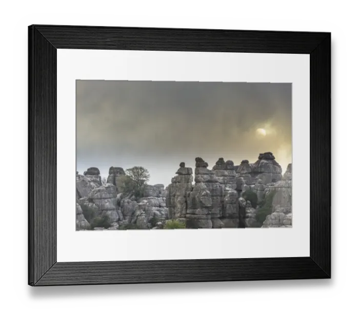 Framed Print : Bizarre limestone rock formations with the sun and fog, El Torcal Nature Reserve, Antequera, Andalusia, Spain Framed Print : Bizarre limestone rock formations with the sun and fog, El Torcal Nature Reserve, Antequera, Andalusia, Spain