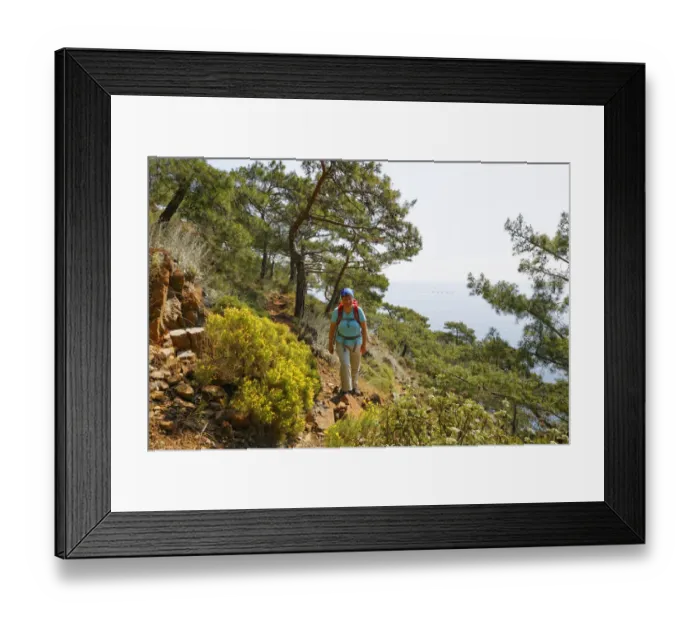 Framed Print : Woman with backpack hiking, Lycian Way, Lycian Coast, Olimpos Beydaglari National Park, Cirali, Lycia, Province of Antalya, Turkey