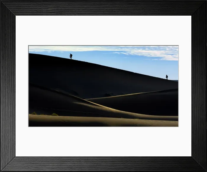Framed Print : Silhouettes of people climbing a dune, desert landscape, Namib, Hardap Region, Namibia Framed Print : Silhouettes of people climbing a dune, desert landscape, Namib, Hardap Region, Namibia