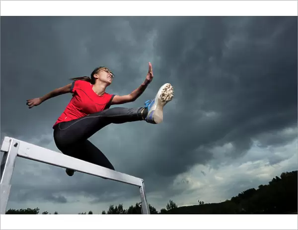 Athlete, 20 years, jumping hurdles, Winterbach, Baden-Wurttemberg, Germany