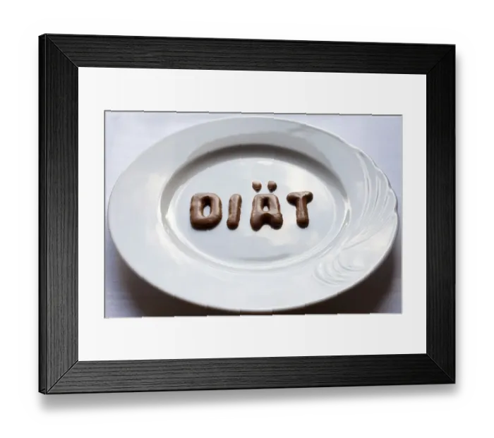 Framed Print : Letters forming the word diaet, German for diet made from Russian bread on a white plate