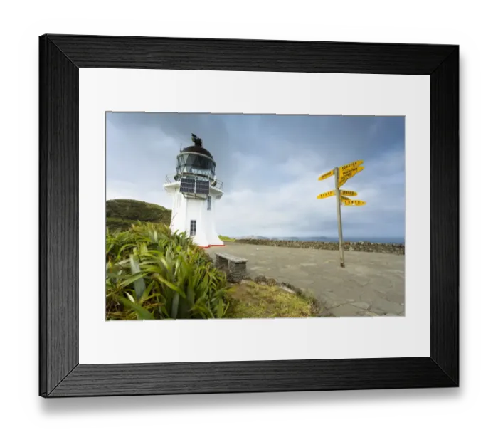 Framed Print : Signpost with distances and lighthouse at Cape Reinga, Cape Reinga, Northland Region, New Zealand Framed Print : Signpost with distances and lighthouse at Cape Reinga, Cape Reinga, Northland Region, New Zealand