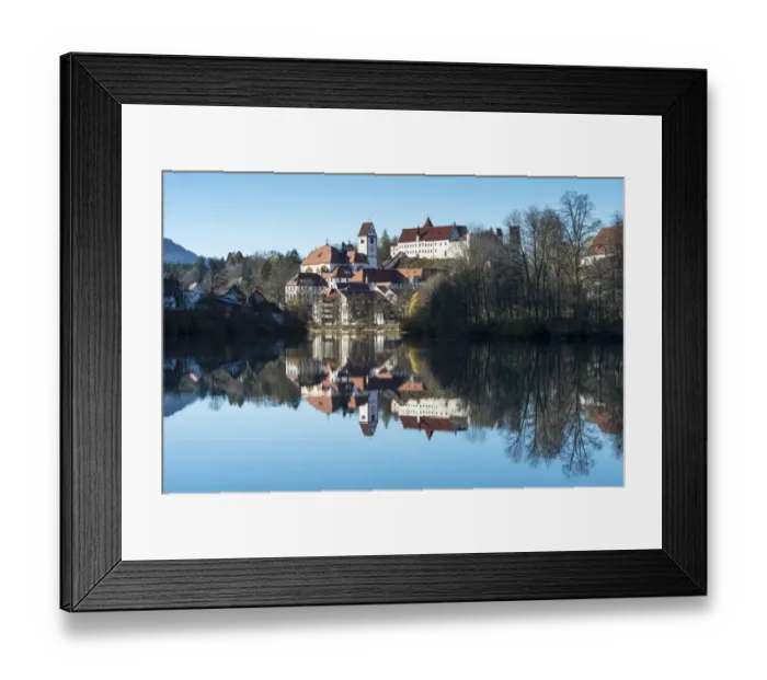 Framed Print : The former Franciscan Monastery of St. Mang, reflection of the castle at top in the Lech river, Fuessen, Ostallgaeu region, Allgaeu, Bavaria, Germany, Europe Framed Print : The former Franciscan Monastery of St. Mang, reflection of the castle at top in the Lech river, Fuessen, Ostallgaeu region, Allgaeu, Bavaria, Germany, Europe
