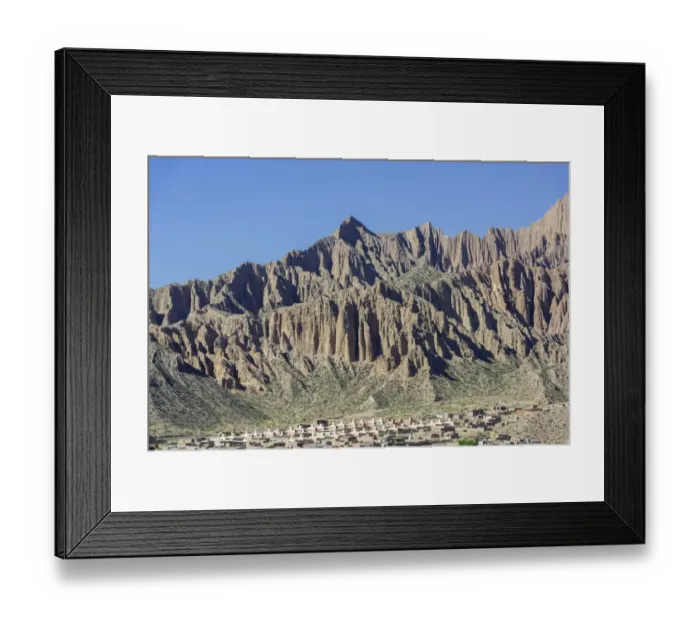 Framed Print : Rugged mountain and a planned settlement, social housing, Tilcara, Jujuy Province, Argentina Framed Print : Rugged mountain and a planned settlement, social housing, Tilcara, Jujuy Province, Argentina