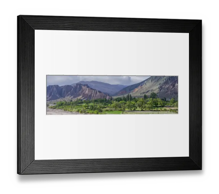 Framed Print : Panoramic, lush vegetation at the Purmamarca river, behind Cerro de los Siete Colores or Hill of Seven Colors in Purmamarca, Jujuy Province, Argentina
