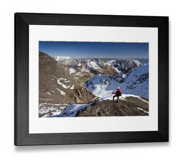 Framed Print : Mountain climber on the summit ridge while descending from Wilde Kreuzspitze Mountain in the Pfunderer Mountains, overlooking the Vals Valley and Wurmaulspitz Mountain, Alto Adige, Italy, Europe Framed Print : Mountain climber on the summit ridge while descending from Wilde Kreuzspitze Mountain in the Pfunderer Mountains, overlooking the Vals Valley and Wurmaulspitz Mountain, Alto Adige, Italy, Europe