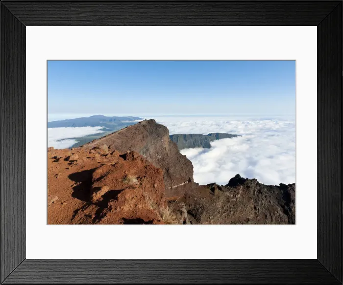 Framed Print : Red volcanic rock on the summit, Piton des Neiges Mountain, 3069 m, above the clouds, near Cilaos, French Overseas Territory, La Reunion