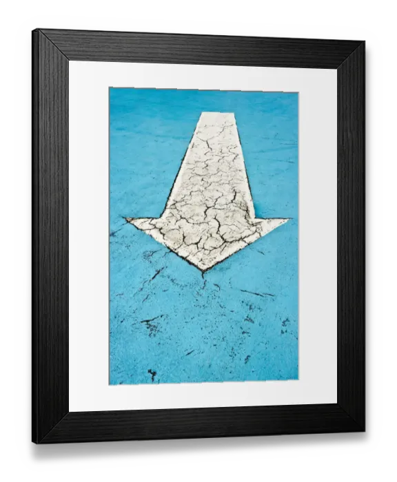 Framed Print : White arrow on blue concrete with cracks Framed Print : White arrow on blue concrete with cracks