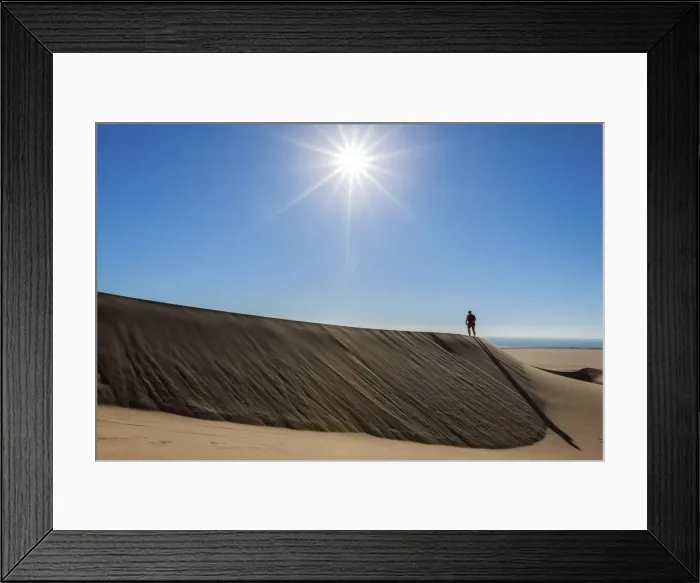 Framed Print : Man walking in the dune belt of Long Beach, Swakopmund, Namibia Framed Print : Man walking in the dune belt of Long Beach, Swakopmund, Namibia