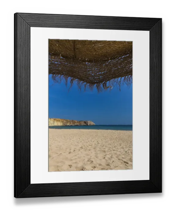 Framed Print : View from underneath a parasol out onto the beach, Praia da Mareta, Sagres, Algarve, Portugal, Europe Framed Print : View from underneath a parasol out onto the beach, Praia da Mareta, Sagres, Algarve, Portugal, Europe