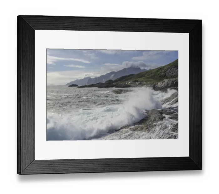 Framed Print : Waves breaking on the rocky coast, cottages and rugged mountains at the back, Flakstad, Lofoten, Nordland, Norway Framed Print : Waves breaking on the rocky coast, cottages and rugged mountains at the back, Flakstad, Lofoten, Nordland, Norway