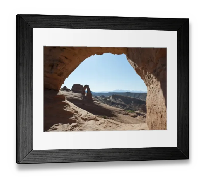 Framed Print : Red sandstone, Delicate Arch, a natural stone arch seen through the window of Frame Arch, Arches National Park, Utah, Western United States, United States of America, North America