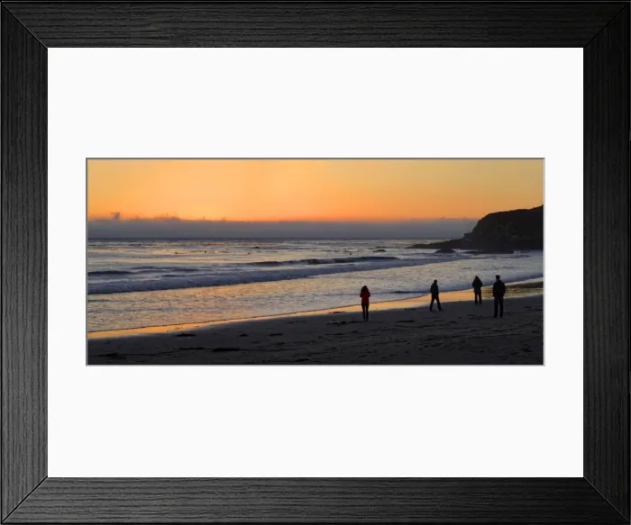Framed Print : People at sunset at the Pacific beach of Cambria, California, United States Framed Print : People at sunset at the Pacific beach of Cambria, California, United States