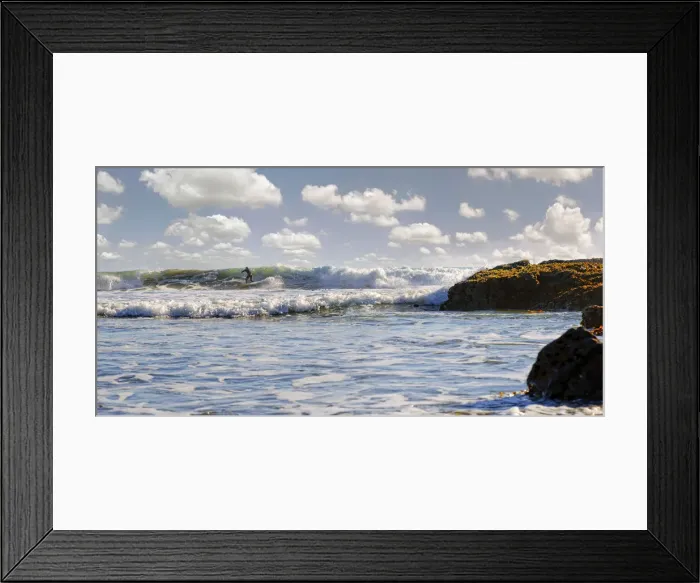 Framed Print : Surfer in the surf on the Pacific beach near Cambria, California, United States Framed Print : Surfer in the surf on the Pacific beach near Cambria, California, United States