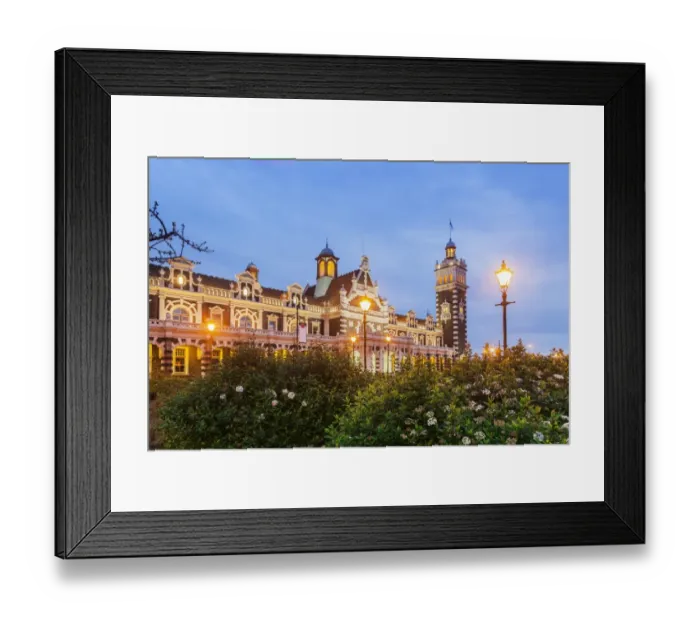 Framed Print : Dunedin Railway Station, illuminated at twilight, Otago, South Island, New Zealand Framed Print : Dunedin Railway Station, illuminated at twilight, Otago, South Island, New Zealand