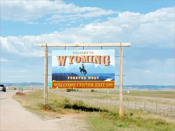 Welcome sign on a highway, Welcome to Wyoming, Forever West, flat landscape, Wyoming, USA