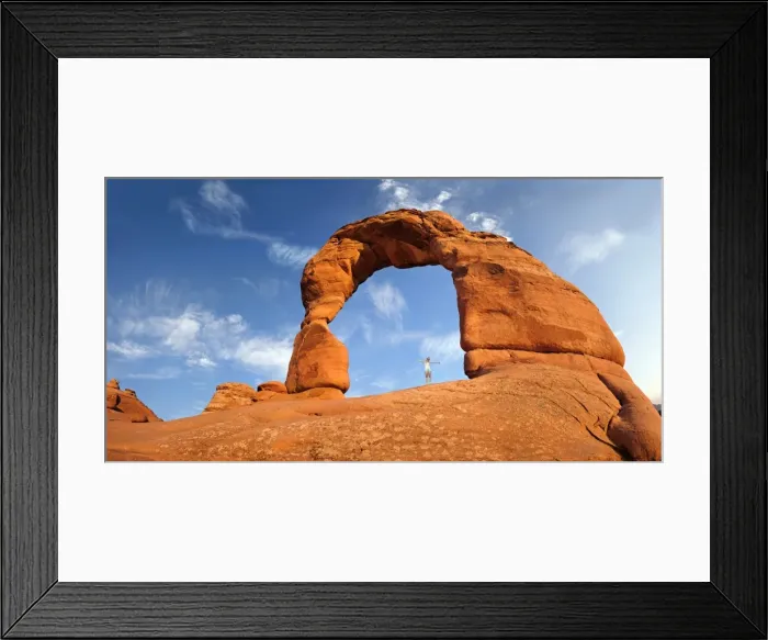 Framed Print : Woman standing under Delicate Arch natural stone arch, Arches-Nationalpark, near Moab, Utah, United States Framed Print : Woman standing under Delicate Arch natural stone arch, Arches-Nationalpark, near Moab, Utah, United States