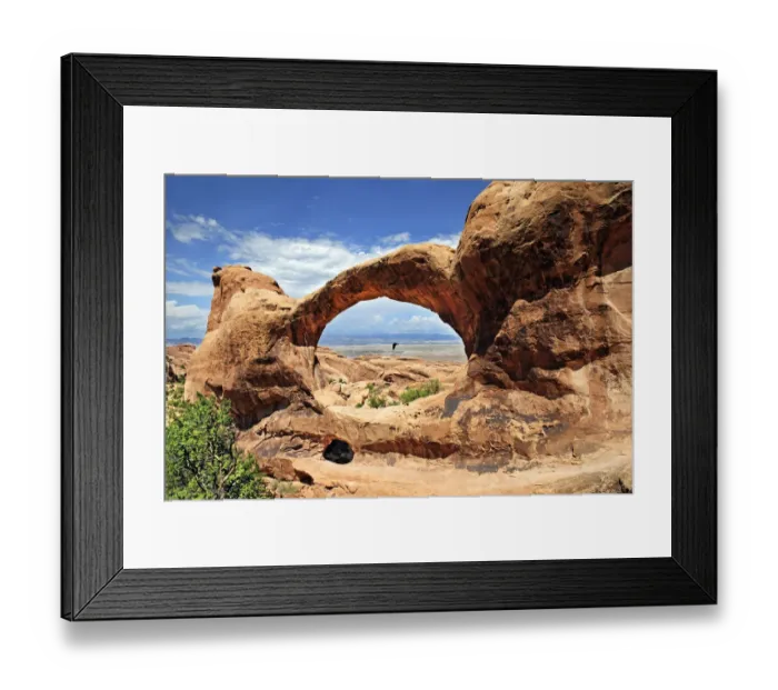 Framed Print : Double O Arch with a raven flying in the middle of the arc, Arches-Nationalpark, near Moab, Utah, United States