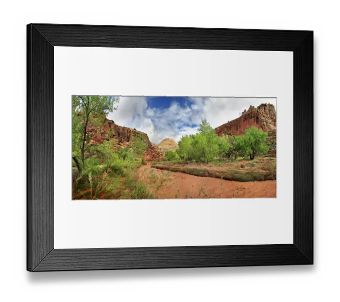 Framed Print : Fremont River coloured red from mud with green leafy trees after a storm, Capitol Reef National Park, Fruita, Utah, United States Framed Print : Fremont River coloured red from mud with green leafy trees after a storm, Capitol Reef National Park, Fruita, Utah, United States