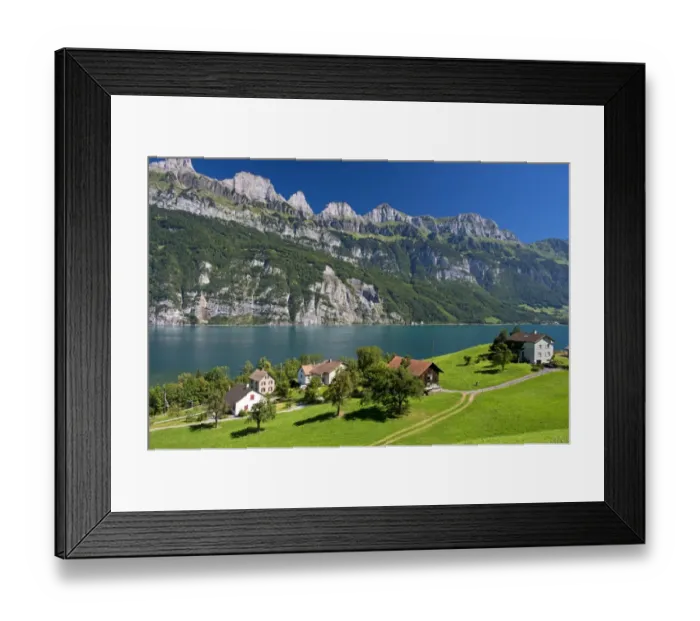 Framed Print : Settlement on Lake Walen in front of the Churfirsten range near Mols, Canton of St. Gallen, Switzerland Framed Print : Settlement on Lake Walen in front of the Churfirsten range near Mols, Canton of St. Gallen, Switzerland