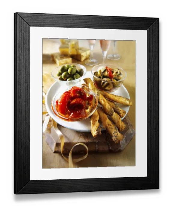 Framed Print : Italian Party buffet food with dried tomatoes, bread sticks or bread sticks, olives and marinated wild mushrooms Framed Print : Italian Party buffet food with dried tomatoes, bread sticks or bread sticks, olives and marinated wild mushrooms