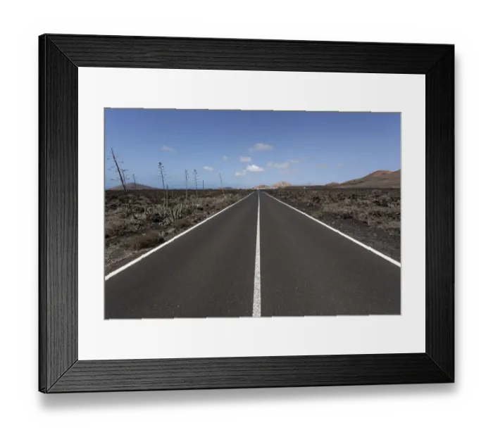 Framed Print : Road through volcanic landscape, near Mancha Blanca, Lanzarote, Canary Islands, Spain