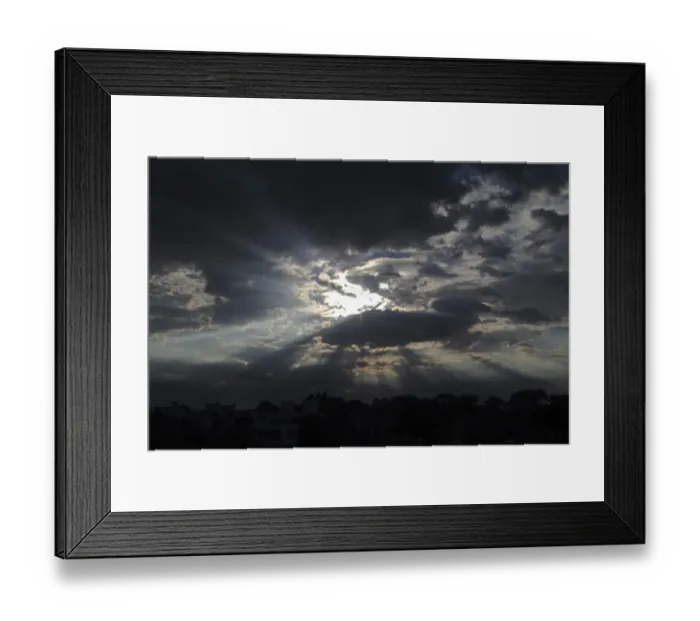 Framed Print : Sky with clouds and rays of sunshine, moody atmosphere Framed Print : Sky with clouds and rays of sunshine, moody atmosphere