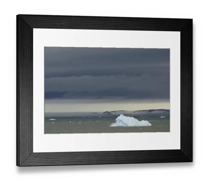 Framed Print : Iceberg floating in Palanderbukta fjord during strong winds and storm clouds, Nordaustlandet, Svalbard Archipelago, Svalbard and Jan Mayen, Norway Framed Print : Iceberg floating in Palanderbukta fjord during strong winds and storm clouds, Nordaustlandet, Svalbard Archipelago, Svalbard and Jan Mayen, Norway