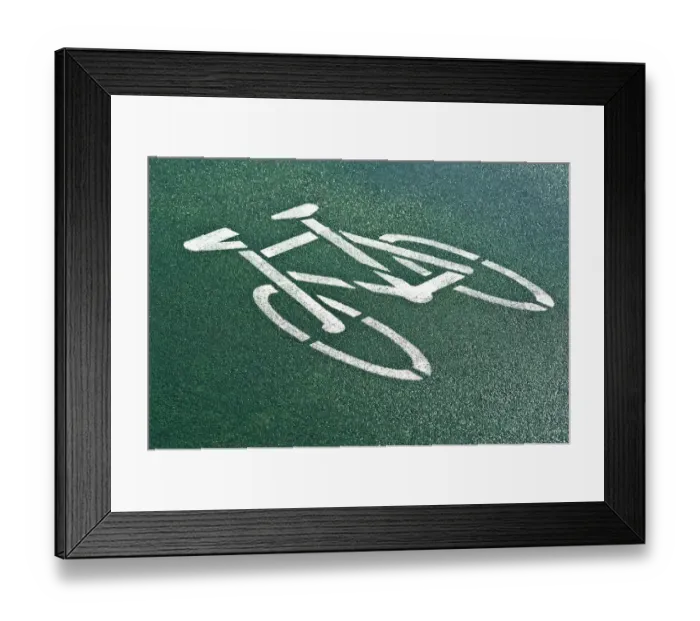 Framed Print : Pictogram, cycle path on gren asphalt Framed Print : Pictogram, cycle path on gren asphalt