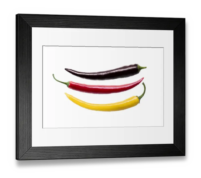 Framed Print : Three chili peppers in the German national colors, photo composing Framed Print : Three chili peppers in the German national colors, photo composing