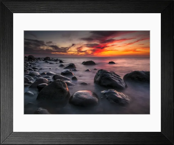 Framed Print : Rocks on a beach at sunset by the sea, bei Nardewitz, Rugen island, Rugen, Mecklenburg-Western Pomerania, Germany Framed Print : Rocks on a beach at sunset by the sea, bei Nardewitz, Rugen island, Rugen, Mecklenburg-Western Pomerania, Germany
