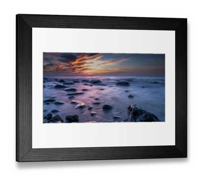 Framed Print : Rocks on a beach at sunset by the sea, bei Nardewitz, Rugen island, Rugen, Mecklenburg-Western Pomerania, Germany Framed Print : Rocks on a beach at sunset by the sea, bei Nardewitz, Rugen island, Rugen, Mecklenburg-Western Pomerania, Germany