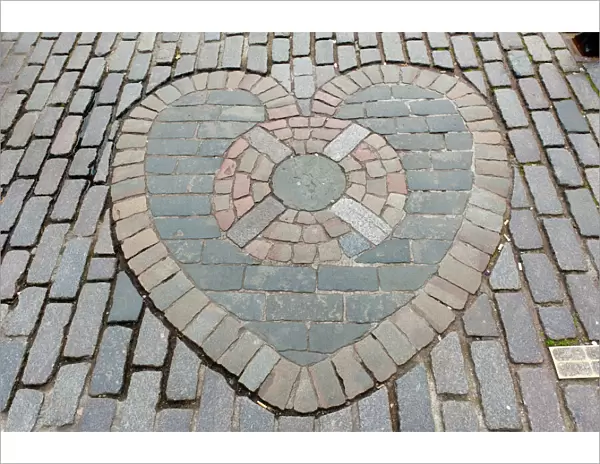 Heart of Midlothian, paving stones mosaic in front of St. Giles Cathedral, High Street, Royal Mile, Edinburgh, Scotland, United Kingdom