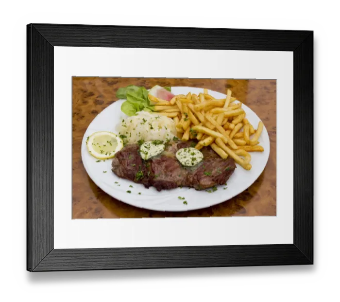 Framed Print : Pork neck steaks with coleslaw, herb butter and fries Framed Print : Pork neck steaks with coleslaw, herb butter and fries