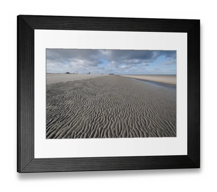 Framed Print : Beach of Sankt Peter-Ording in the morning sun during low tide with stilt houses on the horizon at back, North Sea beach, Schleswig-Holstein, Germany, Europe Framed Print : Beach of Sankt Peter-Ording in the morning sun during low tide with stilt houses on the horizon at back, North Sea beach, Schleswig-Holstein, Germany, Europe